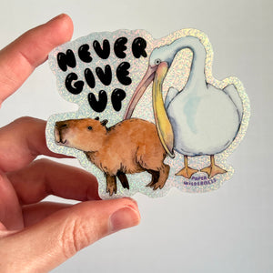 Never Give Up Capybara Pelican Holographic Glitter Vinyl Die Cut Durable Sticker